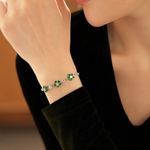 Sparkling zircon flower bracelet in green and white gems with silver chain for women