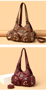 Detail of soft leather handbags in brown and burgundy with metal zip and U-shaped buckle