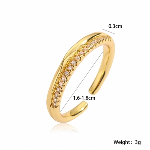 Detail view of 18K gold plated ring showing 0.3cm width and zircon inlay specs