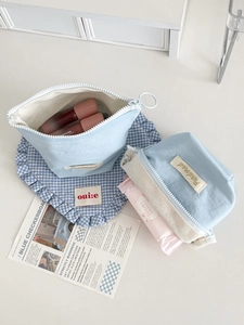 Minimalist sky blue storage pouch set for makeup and toiletries in clean ins style