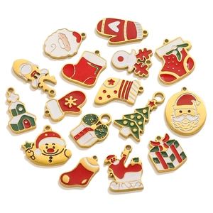 Christmas themed enamel charms including Santa and Reindeer in 18K gold plated finish