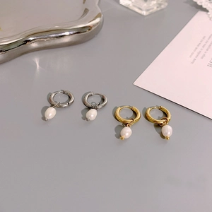 Elegant gold and silver stainless steel hoop earrings with natural white pearl pendants