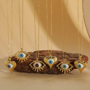 Golden necklace collection featuring heart-shaped evil eye pendants in multiple colors