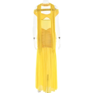 Detail of yellow backless maxi dress with delicate ruching and halter neck ties