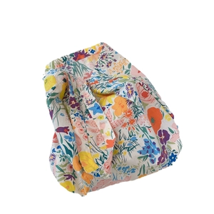 Floral print cotton tote bag with colorful garden pattern for summer casual wear