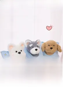 Three plush toy puppies in different colors sitting in a blue and pink storage basket