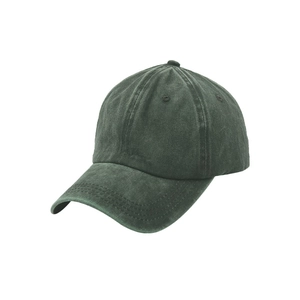 Detail of vintage washed cotton baseball cap in dark green showing premium fabric texture
