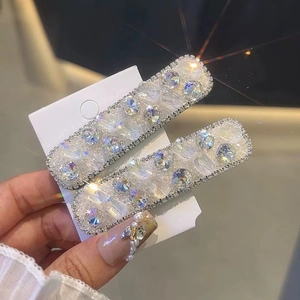 Sparkling crystal rhinestone snap hair clips with brilliant rainbow shine for women