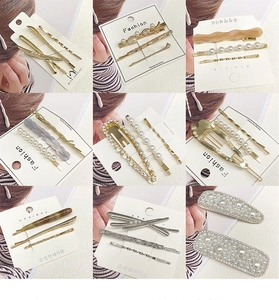 Detailed grid of metal and pearl hair clip sets including barrettes and side pins