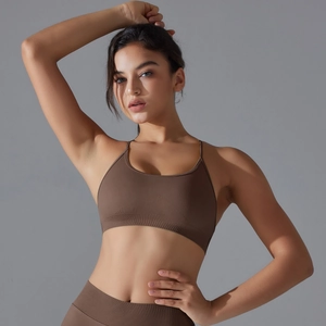 Detailed view of seamless knitted brown sports bra featuring a ribbed supportive band