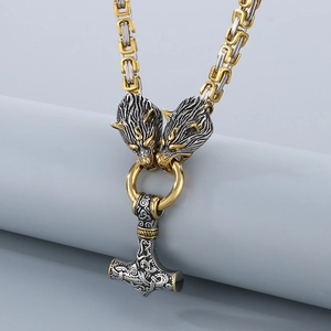 Viking Thor's Hammer necklace with dual wolf heads on a two-tone stainless steel Byzantine chain
