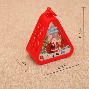 Detail view of red Christmas lantern with Merry Christmas print and size dimensions