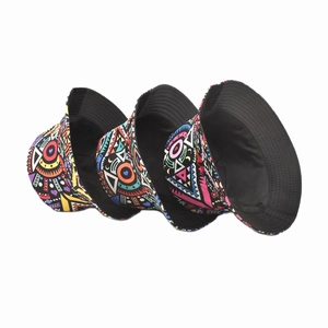 Three geometric pattern bucket hats with bohemian prints on a clean white background