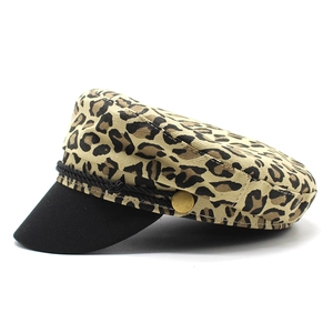 Classic leopard print navy cap with black brim and decorative golden button detail