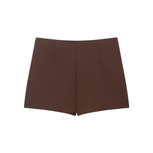 Detailed view of dark brown high-waisted shorts with a concealed side zipper closure