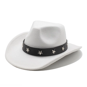 Detail of white felt cowboy hat featuring black leather band with silver star studs