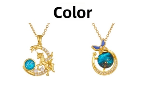 Detail of unicorn moon and blue butterfly star pendant necklaces with cubic zirconia
