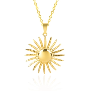 Detail of polished golden sun pendant necklace with radiant rays on white background