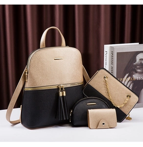 Detail view of 4-piece fashion backpack set in champagne gold and black textured PU leather