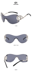 Detail view of silver rimless sunglasses with rhinestone snake hinge and grey lenses