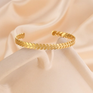 18k gold plated stainless steel cuff bracelet featuring a wheat leaf laurel design