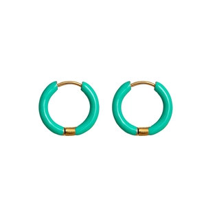 Detailed close-up of mint green enamel hoop earrings with 18K gold-plated metal finish