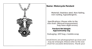 Detail of vintage silver motorcycle engine pendant with stainless steel pearl chain