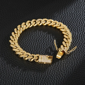 Gold Cuban link bracelet with CNC iced-out diamonds and secure box clasp closure