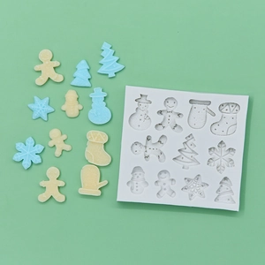 Christmas silicone baking mold with 12 shapes including snowman and tree for DIY cakes