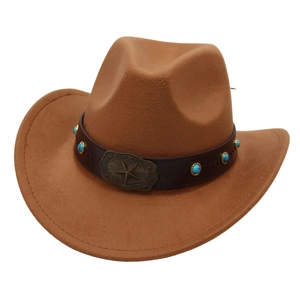 Detail of a brown cowboy hat featuring a leather band with turquoise beads and a bronze star