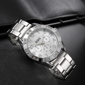 Classic silver metal quartz watch with diamond bezel and three decorative sub-dials