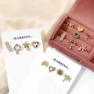 Chic gold-plated earrings set featuring multi-colored rhinestones in heart and palm tree shapes