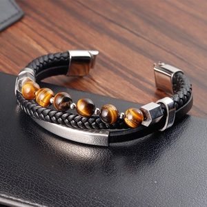 Pulsera de cuero trenzado de varias capas con cuentas ojo de tigre y cierre de metal
