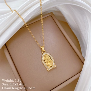 Close-up of Virgin Mary gold pendant with cubic zirconia and sizing specifications