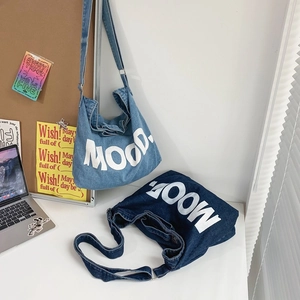Denim crossbody bag with large MOOD. letter print in light and dark blue wash