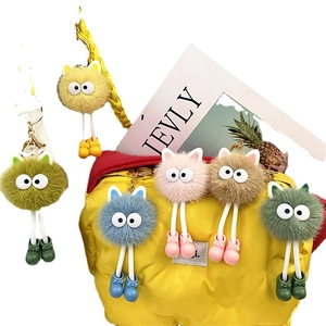 Cute fuzzy coal ball plush keychains with big eyes in various colors for bag decoration