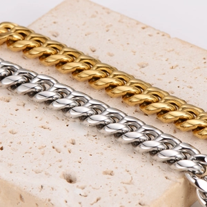 Bracciali cubani in acciaio inossidabile lucidato oro e argento con doppia testa di lupo