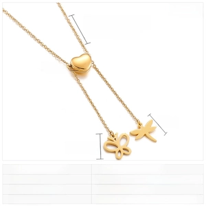 Guide des tailles détaillé pour collier avec pendentifs papillon et libellé en acier