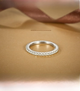 Macro view of the S925 sterling silver eternity ring set with brilliant moissanite stones