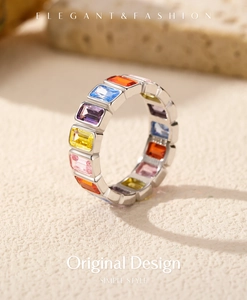 Close-up of s925 silver ring with colorful rectangular gemstones and elegant engraving