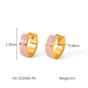 Detail view of 18K gold stainless steel earrings with purple enamel and size markers