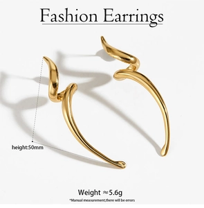 Detail of 50mm gold spiral drop earrings showing polished texture and curved design