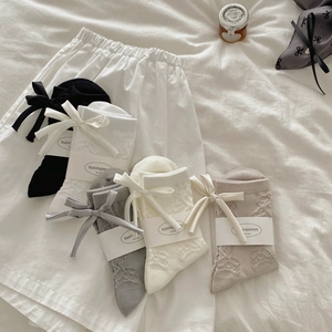 Sweet mid-calf socks with 3D texture and satin bows in five assorted pastel colors