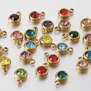 Multiple 6mm gold stainless steel birthstone charms with colorful gemstone crystals