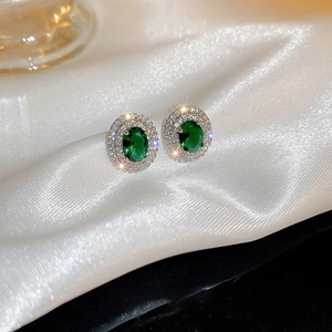 Elegant silver earrings featuring oval green gemstones and double layers of white zircon stones