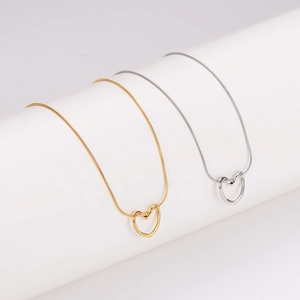 Minimalist hollow heart necklaces in gold and silver finish with sleek snake chains