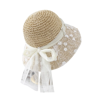 Elegant ladies crochet straw hat with white lace embroidery and pearl bow decoration
