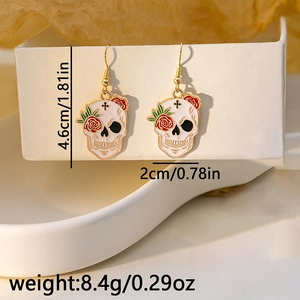 Detail showing skull rose drop earrings with size measurements of 4.6cm and 2cm