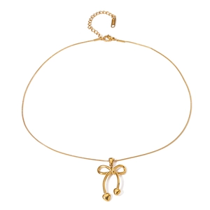 Detail of 18K gold butterfly bow necklace with heart charms on smooth snake chain