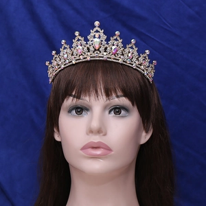 Elegant gold leaf crown with colorful rhinestones and crystals for weddings and parties